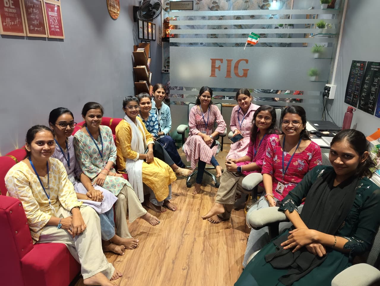 The FIG team seated together in the Burhar office