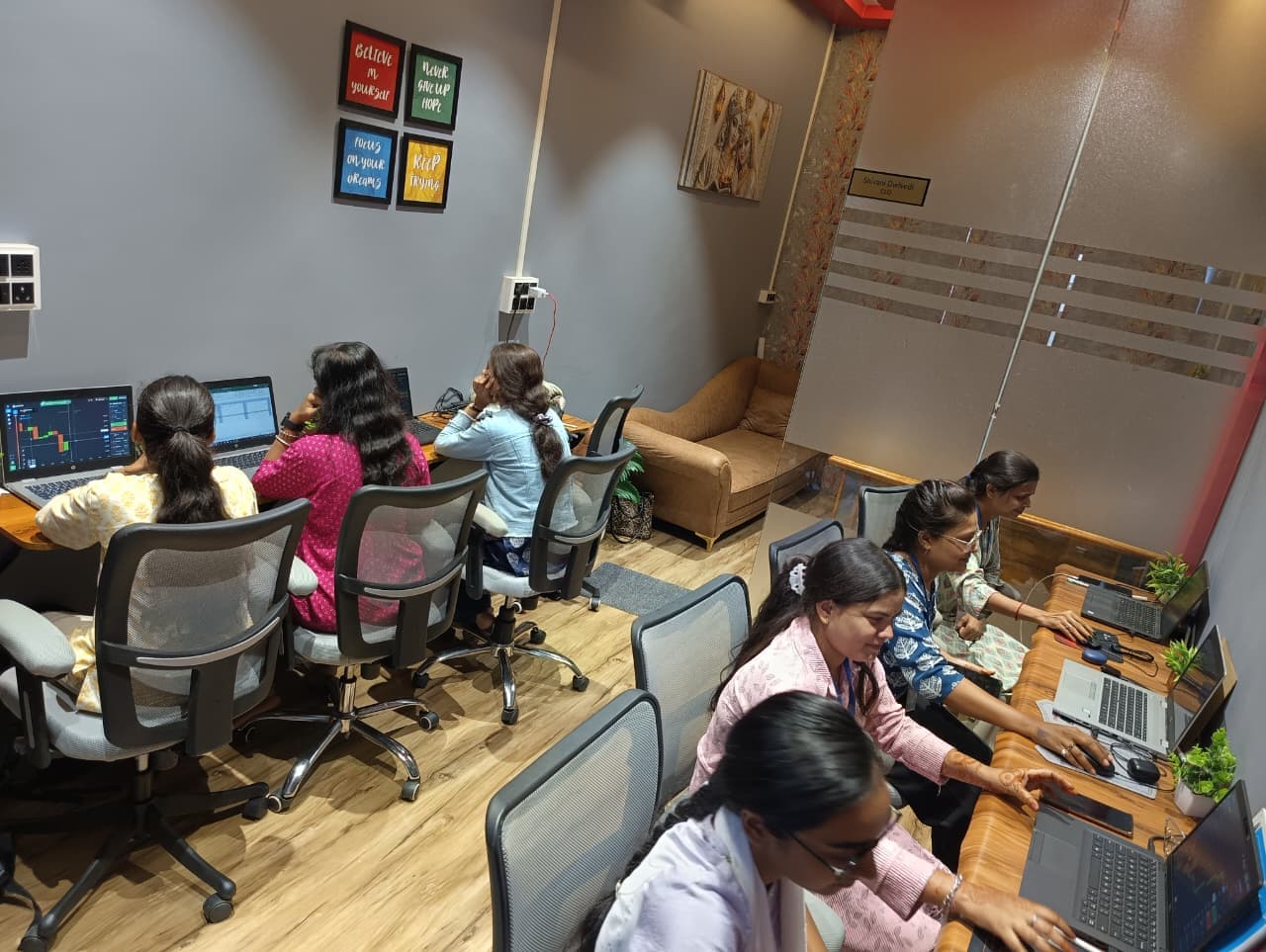 A view across the FIG office with team members at their desks